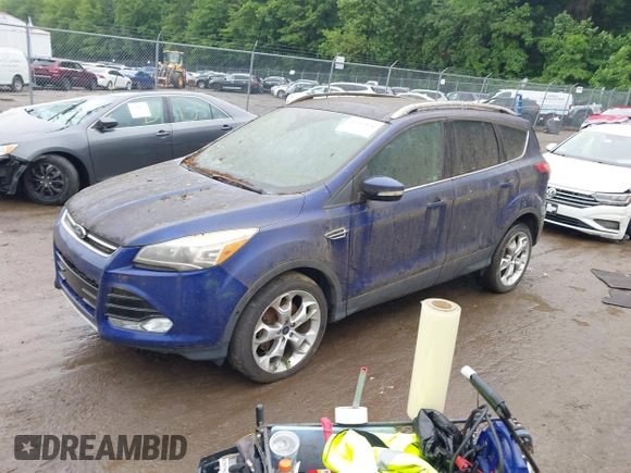 2016 Ford Escape Titanium with VIN 1FMCU9J95GUB65432, listed as a IAAI auction lot 42503176 with 96,362 mi miles and . Bid and sale history available at DreamBid. Image 16.
