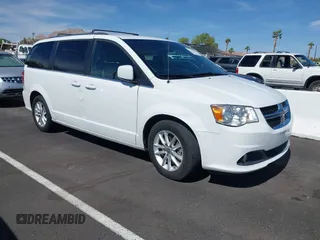 2018 Dodge Grand Caravan SXT z VIN 2C4RDGCG3JR209074, wystawiony jako IAAI lot #42247090 z przebiegiem 82 385 mil mil oraz . Historia ofert i sprzedaży dostępna na DreamBid. Obrazek 1.