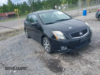 2012 Nissan Sentra S z VIN 3N1AB6AP1CL624302, wystawiony jako IAAI lot #42321938 z przebiegiem 186 537 mil mil oraz . Historia ofert i sprzedaży dostępna na DreamBid. Obrazek 1.