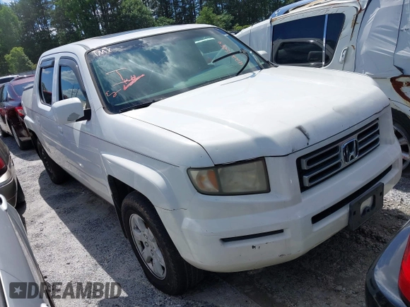 2006 Honda Ridgeline RTL z VIN 2HJYK16506H512654, wystawiony jako IAAI lot #42245264 z przebiegiem 303 551 mil mil oraz . Historia ofert i sprzedaży dostępna na DreamBid. Obrazek 1.