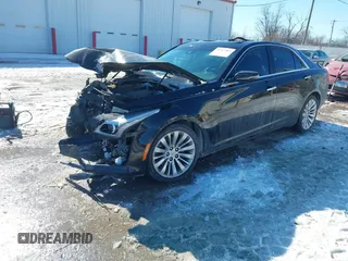 2014 Cadillac CTS Luxury AWD with VIN 1G6AX5SX3E0191673, listed as a IAAI auction lot 41617087 with 68,581 mi miles and . Bid and sale history available at DreamBid. Image 2.