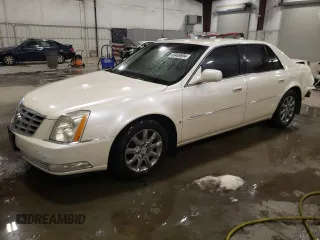 2009 Cadillac DTS 1SC z VIN 1G6KD57Y69U129827, wystawiony jako Copart lot #83469594 z przebiegiem 145 995 mil mil oraz Szkoda całkowita • Salvage title. Historia ofert i sprzedaży dostępna na DreamBid. Obrazek 1.