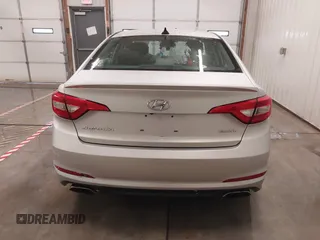 2015 Hyundai Sonata Sport with VIN 5NPE34AF3FH141616, listed as a IAAI auction lot 41005650 with 138,291 mi miles and . Bid and sale history available at DreamBid. Image 16.