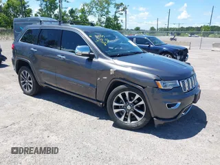 2017 Jeep Grand Cherokee Overland with VIN 1C4RJFCG2HC641791, listed as a IAAI auction lot 42566654 with 116,764 mi miles and . Bid and sale history available at DreamBid. Image 1.