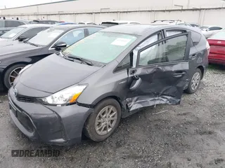 2017 Toyota Prius v Two with VIN JTDZN3EU6HJ069884, listed as a IAAI auction lot 41493416 with 37,716 mi miles. Bid and sale history available at carsss.com. Image 2.