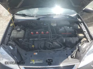 2006 Ford Focus S with VIN 1FAFP34N76W246035, listed as a Copart auction lot 61985015 with 196,498 mi miles and Salvage title. Bid and sale history available at DreamBid. Image 11.