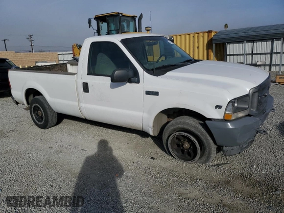 2002 Ford Super Duty F-250 XL with VIN 1FTNF20L52ED47162, listed as a Copart auction lot 79675304 with 216,687 mi miles and Salvage Title. Bid and sale history available at carsss.com. Image 4.