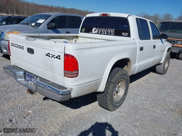 2001 Dodge Dakota Sport with VIN 1B7HG2AN21S290140, listed as a IAAI auction lot 41702251 with 350,678 mi miles. Bid and sale history available at carsss.com. Image 4.