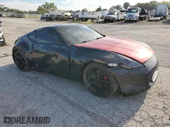 2014 Nissan 370Z z VIN JN1AZ4EH9EM636239, wystawiony jako Copart lot #69833264 z przebiegiem 110 802 mil mil oraz Szkoda całkowita • Salvage title. Historia ofert i sprzedaży dostępna na DreamBid. Obrazek 4.