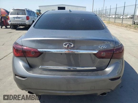 2014 Infiniti Q50 Premium with VIN JN1BV7AP2EM677469, listed as a Copart auction lot 61627125 with 106,670 mi miles and Salvage title. Bid and sale history available at DreamBid. Image 6.