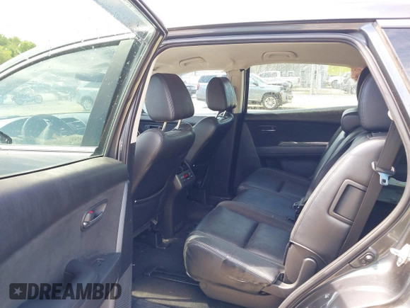 2014 Mazda CX-9 Touring with VIN JM3TB3CV9E0426767, listed as a IAAI auction lot 42301021 with 129,497 mi miles and . Bid and sale history available at DreamBid. Image 8.
