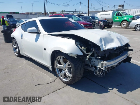 2009 Nissan 370Z Touring with VIN JN1AZ44E99M411252, listed as a IAAI auction lot 41969671 with 91,873 mi miles and . Bid and sale history available at DreamBid. Image 1.