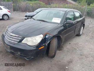 2007 Chrysler Sebring Touring with VIN 1C3LC56K87N509796, listed as a IAAI auction lot 42537900 with 146,542 mi miles and . Bid and sale history available at DreamBid. Image 2.