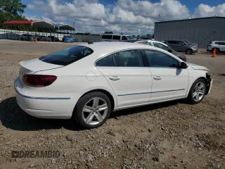 2014 Volkswagen CC Sport with VIN WVWBP7AN8EE538737, listed as a Copart auction lot 68656344 with 131,941 mi miles and Salvage Title. Bid and sale history available at carsss.com. Image 3.