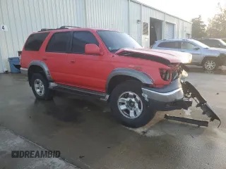 2000 Toyota 4Runner SR5 with VIN JT3GN86RXY0174498, listed as a Copart auction lot 43380235 with 307,230 mi miles and Salvage Title. Bid and sale history available at DreamBid. Image 4.