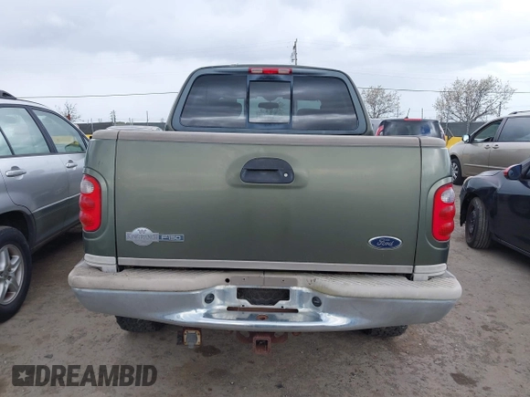 2003 Ford F-150 XLT with VIN 1FTRW08L43KC83824, listed as a IAAI auction lot 41885702 with 242,195 mi miles. Bid and sale history available at carsss.com. Image 16.