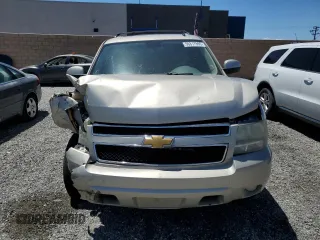 2013 Chevrolet Suburban LT with VIN 1GNSCJE06DR140058, listed as a Copart auction lot 56317995 with 124,345 mi miles and Salvage title. Bid and sale history available at DreamBid. Image 5.