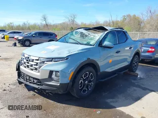 2023 Hyundai Santa Cruz SEL z VIN 5NTJC4AE4PH042943, wystawiony jako IAAI lot #41807647 z przebiegiem Nie podano mil oraz . Historia ofert i sprzedaży dostępna na DreamBid. Obrazek 2.