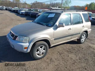 2001 Honda CR-V SE with VIN JHLRD18781C052515, listed as a IAAI auction lot 42090187 with 176,875 mi miles. Bid and sale history available at carsss.com. Image 2.