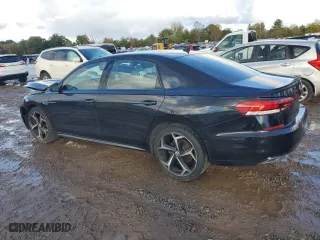 2021 Volkswagen Passat 2.0T R-Line with VIN 1VWMA7A38MC006789, listed as a Copart auction lot 74357194 with 134,546 mi miles and Salvage Title. Bid and sale history available at carsss.com. Image 2.