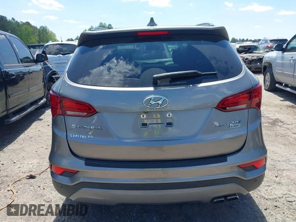 2017 Hyundai Santa Fe Ultimate z VIN 5NMZW4LA7HH047989, wystawiony jako IAAI lot #42051500 z przebiegiem 75 747 mil mil oraz . Historia ofert i sprzedaży dostępna na DreamBid. Obrazek 16.