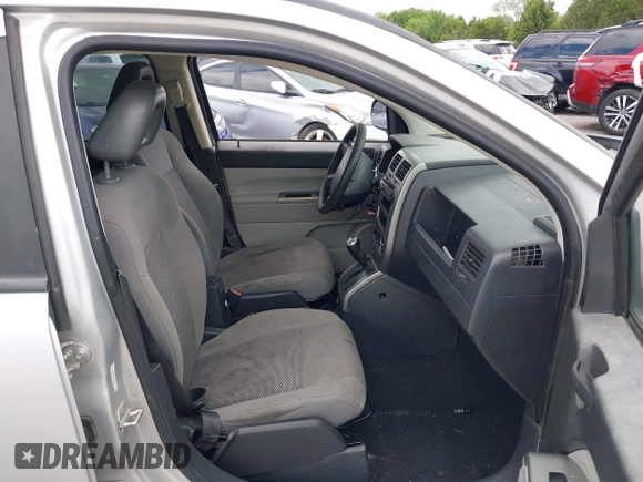 2007 Jeep Compass Sport with VIN 1J8FF47W97D279230, listed as a IAAI auction lot 42207379 with 205,058 mi miles and . Bid and sale history available at carsss.com. Image 5.