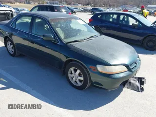 2000 Honda Accord SE z VIN 1HGCG567XYA057694, wystawiony jako IAAI lot #41734805 z przebiegiem 239 330 mil mil oraz . Historia ofert i sprzedaży dostępna na DreamBid. Obrazek 1.