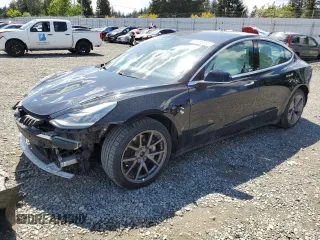 2020 Tesla Model 3 Long Range z VIN 5YJ3E1EBXLF795689, wystawiony jako Copart lot #56703555 z przebiegiem 62 556 mil mil oraz Szkoda całkowita • Salvage title. Historia ofert i sprzedaży dostępna na DreamBid. Obrazek 1.