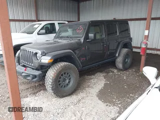 2021 Jeep Wrangler Unlimited Rubicon with VIN 1C4JJXFM6MW538774, listed as a IAAI auction lot 42368651 with 49,490 mi miles and . Bid and sale history available at DreamBid. Image 17.