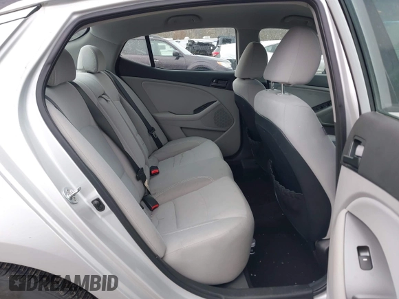 2013 Kia Optima LX with VIN 5XXGM4A74DG129353, listed as a IAAI auction lot 42035909 with 140,315 mi miles. Bid and sale history available at carsss.com. Image 8.