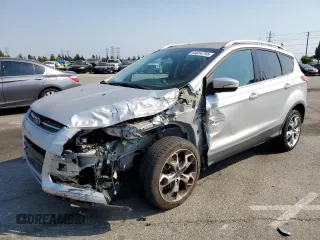 2015 Ford Escape Titanium с VIN 1FMCU9J90FUB03760, выставлен на аукционе Copart как лот 64854755 с пробегом 84 009 миль миль и Списание • Salvage title. История ставок и продаж доступна на DreamBid. Изображение 1.