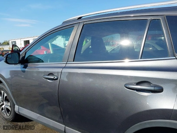 2016 Toyota RAV4 LE with VIN 2T3ZFREV7GW305998, listed as a IAAI auction lot 41869024 with 163,463 mi miles. Bid and sale history available at carsss.com. Image 14.