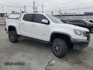 2018 Chevrolet Colorado 4WD ZR2 with VIN 1GCPTEE1XJ1105919, listed as a Copart auction lot 43081875 with 122,345 mi miles and Salvage Title. Bid and sale history available at carsss.com. Image 4.