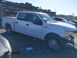 2019 Ford F-150 XL with VIN 1FTEW1C51KKC22877, listed as a IAAI auction lot 41774791 with 143,939 mi miles and . Bid and sale history available at carsss.com. Image 1.