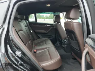 2015 BMW X4 xDrive35i with VIN 5UXXW5C55F0E87384, listed as a Copart auction lot 56299284 with 182,434 mi miles and Clean Title. Bid and sale history available at carsss.com. Image 11.