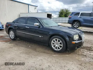 2008 Chrysler 300 C Hemi with VIN 2C3KA63H38H281359, listed as a Copart auction lot 70210504 with 114,796 mi miles and Salvage Title. Bid and sale history available at carsss.com. Image 4.