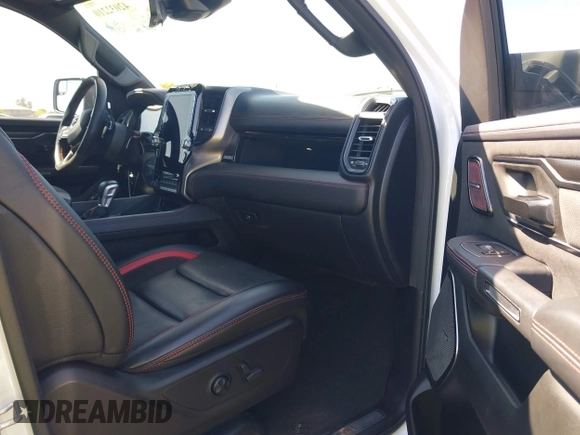 2022 Ram 1500 TRX with VIN 1C6SRFU95NN245954, listed as a IAAI auction lot 42032210 with 30,870 mi miles and . Bid and sale history available at DreamBid. Image 5.