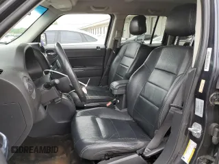 2014 Jeep Patriot Limited with VIN 1C4NJPCB9ED900811, listed as a Copart auction lot 58061115 with 230,415 mi miles and Salvage title. Bid and sale history available at DreamBid. Image 7.