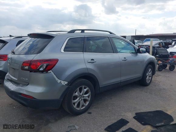 2015 Mazda CX-9 Touring with VIN JM3TB2CA6F0457189, listed as a IAAI auction lot 41529631 with 117,444 mi miles. Bid and sale history available at carsss.com. Image 4.