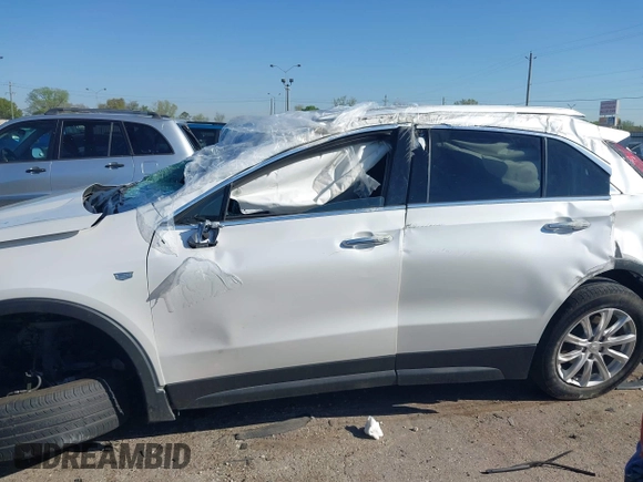 2022 Cadillac XT4 FWD Luxury with VIN 1GYAZAR48NF170949, listed as a IAAI auction lot 41857671 with 25,881 mi miles and . Bid and sale history available at carsss.com. Image 14.