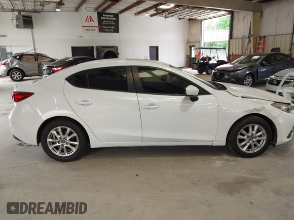 2014 Mazda 3 i Touring with VIN JM1BM1V70E1134498, listed as a IAAI auction lot 42495912 with 116,770 mi miles and . Bid and sale history available at DreamBid. Image 13.