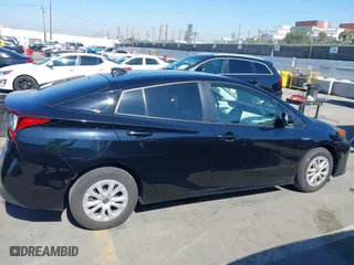 2022 Toyota Prius L Eco with VIN JTDKAMFU3N3165036, listed as a IAAI auction lot 41657575 with 44,099 mi miles. Bid and sale history available at carsss.com. Image 14.