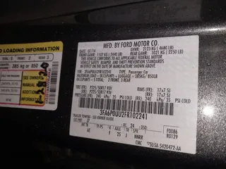 2015 Ford Fusion S Hybrid with VIN 3FA6P0UU2FR102241, listed as a IAAI auction lot 41003479 with 88,020 mi miles. Bid and sale history available at carsss.com. Image 9.