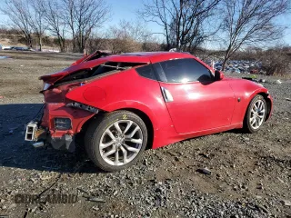 2014 Nissan 370Z Nismo with VIN JN1AZ4EH7EM630228, listed as a Copart auction lot 87024444 with 88,456 mi miles and Salvage title. Bid and sale history available at DreamBid. Image 3.