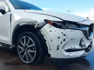 2018 Mazda CX-5 Touring with VIN JM3KFACM1J1431462, listed as a IAAI auction lot 41038099 with 77,489 mi miles. Bid and sale history available at carsss.com. Image 6.
