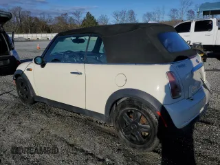 2008 MINI Convertible with VIN WMWRF33588TG18353, listed as a Copart auction lot 49401615 with 124,540 mi miles and Salvage Title. Bid and sale history available at DreamBid. Image 2.