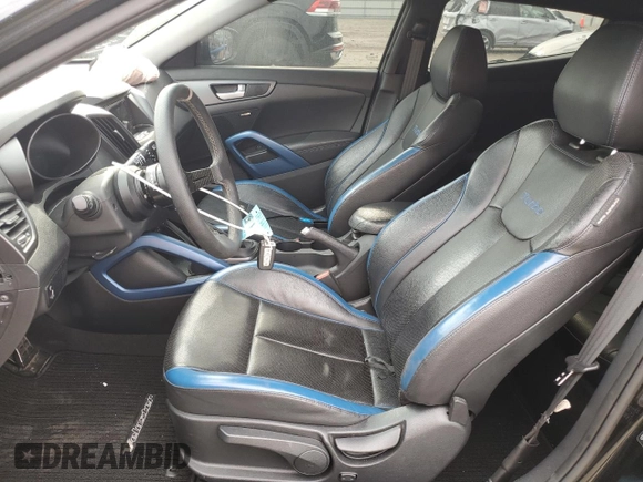 2013 Hyundai Veloster Turbo z VIN KMHTC6AE7DU152689, wystawiony jako Copart lot #51569125 z przebiegiem 102 152 mil mil oraz Szkoda całkowita • Salvage title. Historia ofert i sprzedaży dostępna na DreamBid. Obrazek 7.