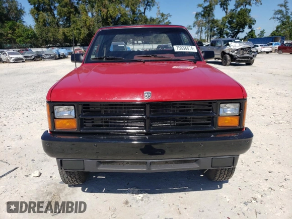 1989 Dodge Dakota z VIN 1B7GG69X9KS181359, wystawiony jako Copart lot #75638874 z przebiegiem 104 095 mil mil oraz Szkoda całkowita • Salvage title. Historia ofert i sprzedaży dostępna na DreamBid. Obrazek 5.