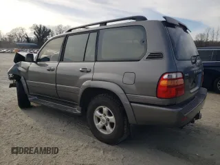 2000 Toyota Land Cruiser with VIN JT3HT05J3Y0088425, listed as a Copart auction lot 41387034 with 243,408 mi miles and Salvage Title. Bid and sale history available at carsss.com. Image 2.
