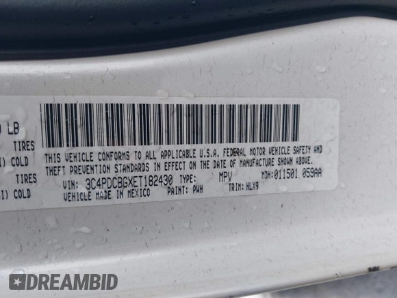 2014 Dodge Journey SXT with VIN 3C4PDCBGXET182430, listed as a IAAI auction lot 41599489 with 143,889 mi miles. Bid and sale history available at carsss.com. Image 9.